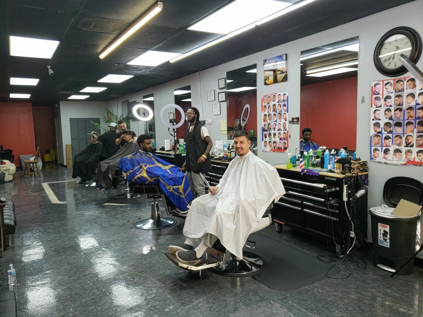 Prince BarberShop interior with clients in San Antonio